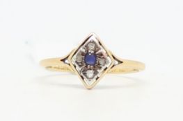 Sapphire and diamond ring, round cut sapphire, with rose cut diamonds, stamped and tested as 18ct,