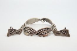 Matching earrings and bracelet suite, comprising a link bracelet marked 'Sterling Taxco' with