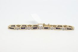 Sapphire and diamond bracelet, panels on three channel set sapphires, spaced with single cut diamond