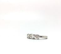 Three stone diamond ring, round brilliant cut diamonds claw set, estimated as 0.45ct / 0.52ct / 0.