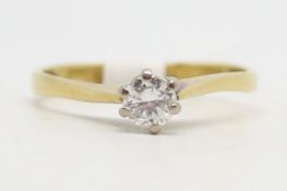 Single stone diamond ring, round brilliant cut diamond six claw set, weighing 0.28ct, in yellow