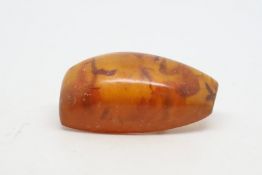 Amber brooch, on a yellow metal pin