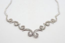 Diamond necklace, brilliant cut diamonds, articulated link design, in white metal stamped and tested