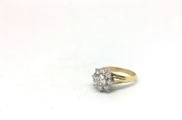 Diamond cluster ring, brilliant cut diamonds claw set, centre diamond estimated weight 0.60ct,