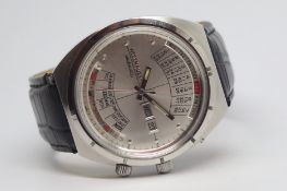 Gentlemen's vintage Wittnauer automatic calendar watch, over sized silvered dial, day and date