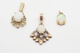 Three opal pendants, all set in 9ct yellow gold