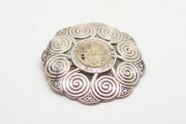 Silver brooch, Celtic design, marked 'Un Amour Solide Est La Meilleure Des Richesses', measures