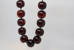 Large single row of vintage cherry amber beads, 25 beads approximately 18x16mm each strung