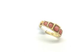 Victorian coral five stone ring, five round cabochon cut coral stones set in a stepped five stone