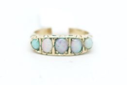 Five stone opal ring, five graduated opals mounted in 9ct yellow gold, ring size L1/2