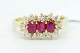 Synthetic ruby and cubic zirconia ring set in 18ct gold, finger size L