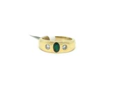 Gentlemen's three stone emerald and diamond ring, central oval cut emerald with a round brilliant