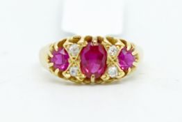 Synthetic ruby and diamond ring, mounted in yellow metal, ring size L