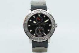 Gentlemen's Ulysee Nardin Wirstwatch, circular black textured dial with luminous hour markers and