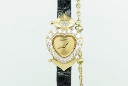 Ladies Delaneau Cocktail Diamond Watch, champagne dial heart shaped diamond set bezel, on a black