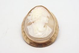 Victorian shell cameo brooch, in a yellow metal engraved surround, tested as 9ct, measures