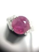 Burmese Ruby and diamond ring, central ruby weighing 3.68ct, double claw set, diamond set split