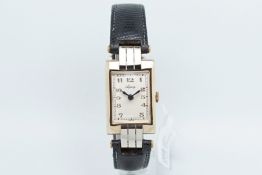 Gentlemen's Asprey 9ct Gold Wristwatch, rectangular beige dial with Arabic numerals and gun metal