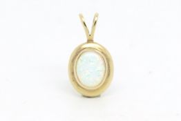 Synthetic opal pendant, mounted in 9ct gold