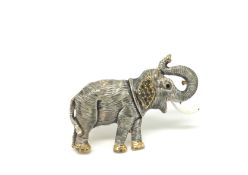 Enamel elephant brooch, grey enamel with detail, stone set ears, ruby set eye, white enamel tusk, in