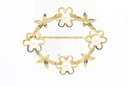 9ct yellow gold pearl floral brooch, oval open brooch, set with four flower motifs centrally set