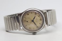 Vintage Rolex reference 7052, circular dial with gilt baton and Arabic numerals, subsidiary