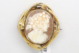 Victorian gold plated cameo brooch, depicting a lady with fruit in their hair