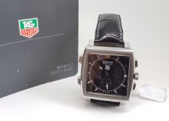 Gentlemen's Tag Heuer Monaco 69 Wristwatch w/ Paperwork, square black dial with baton hour markers