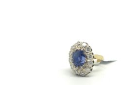 Ceylon sapphire and diamond ring, central 3.42ct cushion cut sapphire, accompanied by a Carat Gem