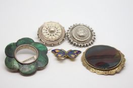 Selection of mainly silver brooches, including a heavy malachite brooch
