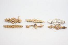 Six bar brooches, including a wishbone bar brooch, two horseshoe bar brooches, and a seed pearl