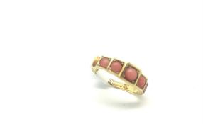 Victorian coral five stone ring, five round cabochon cut coral stones set in a stepped five stone