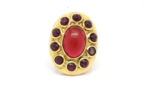 Large cabochon garnet dress ring, central 16x11mm cabochon garnet set with 10 faceted round cut