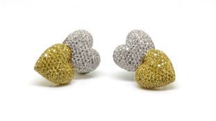 Dianoor - yellow and white diamond set earrings, each as two bombe diamond set hearts, one in