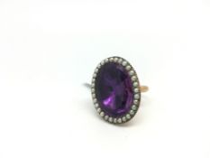 Victorian amethyst and pearl ring, large oval cut amethyst, 24x18mm, foils backed, border of seed