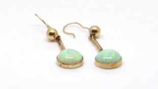 A pair of opal drop earrings, circular cabochon cut opals measuring approximately 9.60mm in