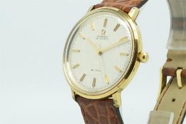 Gentleman's Omega DeVille Wristwatch, circular linen dial with gold baton hour markers and minute
