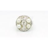 Art Deco French pearl and diamond panel ring, three old cut diamonds estimated weight 0.60ct each,