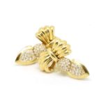 A pair of quality diamond set bow earrings, gold work bow with diamond set drops, can be worn as