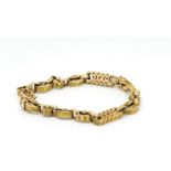 Edwardian pierced Albert chain bracelet, in 9ct rose gold, approximately 12.1g gross