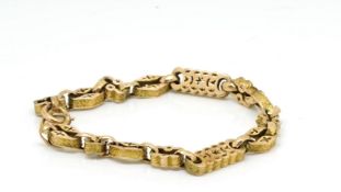 Edwardian pierced Albert chain bracelet, in 9ct rose gold, approximately 12.1g gross