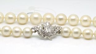 Pearl and diamond necklace, single row ow large 12.5mm - 10.5mm silvery/white pearls strung knotted,