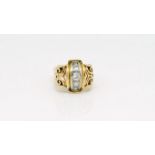 French diamond scroll ring, central graduating row of diamonds between two pierced scroll shoulders,