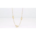 Freshwater pearl necklace, pearl set chain with three clusters of pearls, in 18ct white gold