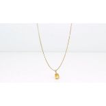 Citrine pendant, oval cut citrine, with 44cm curb chain, in 9ct yellow gold