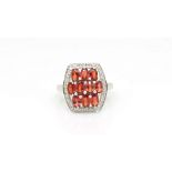 Garnet and diamond dress ring, in 9ct white gold, ring size O