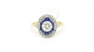 Diamond and sapphire deco style ring, central brilliant cut diamond set with a border of calibre cut