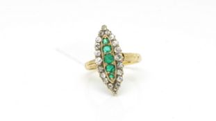 Victorian emerald and diamond marquise panel ring, five graduating emeralds set with a border of old