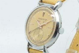 Gentleman's Jaeger LeCoultre Triple Calendar Vintage Wristwatch, circular salmon dial with bronze