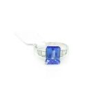 Tanzanite and diamond ring, central rectangular cut tanzanite, excellent deep blue/violet colour,